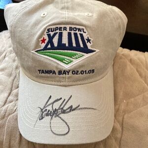 Super Bowl 43 hat, it has an autograph on it but I’m not sure who signed it.